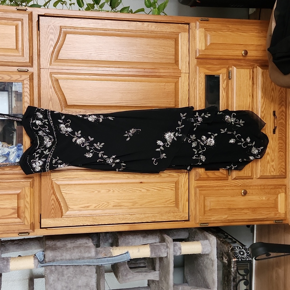 Prom ready Asymetrical evening gown sheer layers.